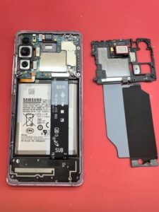 Remove-the-motherboard-back-cover-and-earpiece